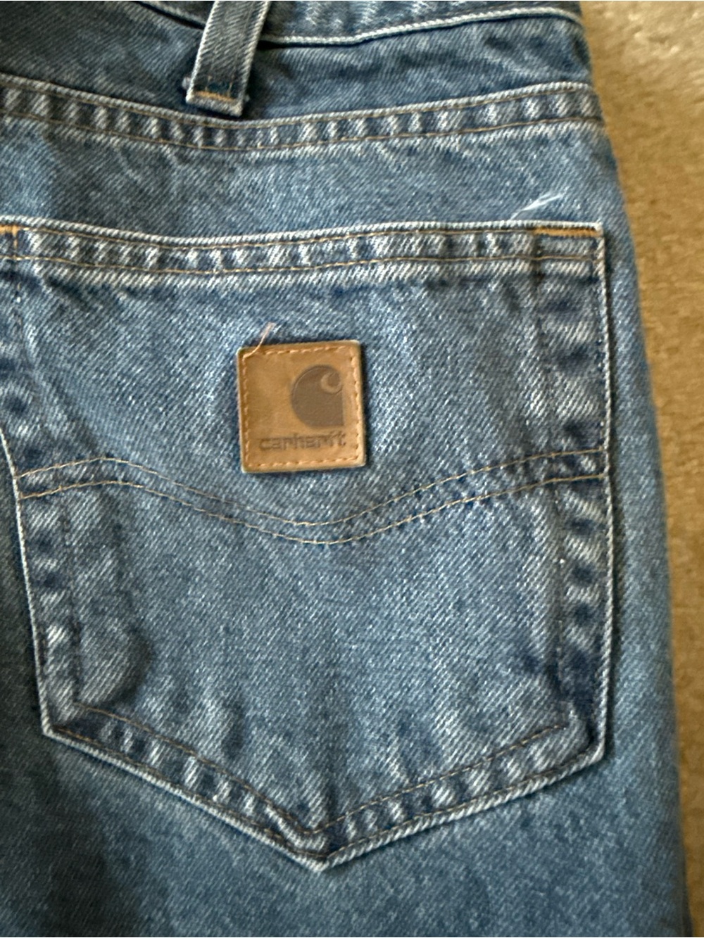 Carhartt Men's Classic Blue Denim Relaxed Jeans with Leather Logo Patch